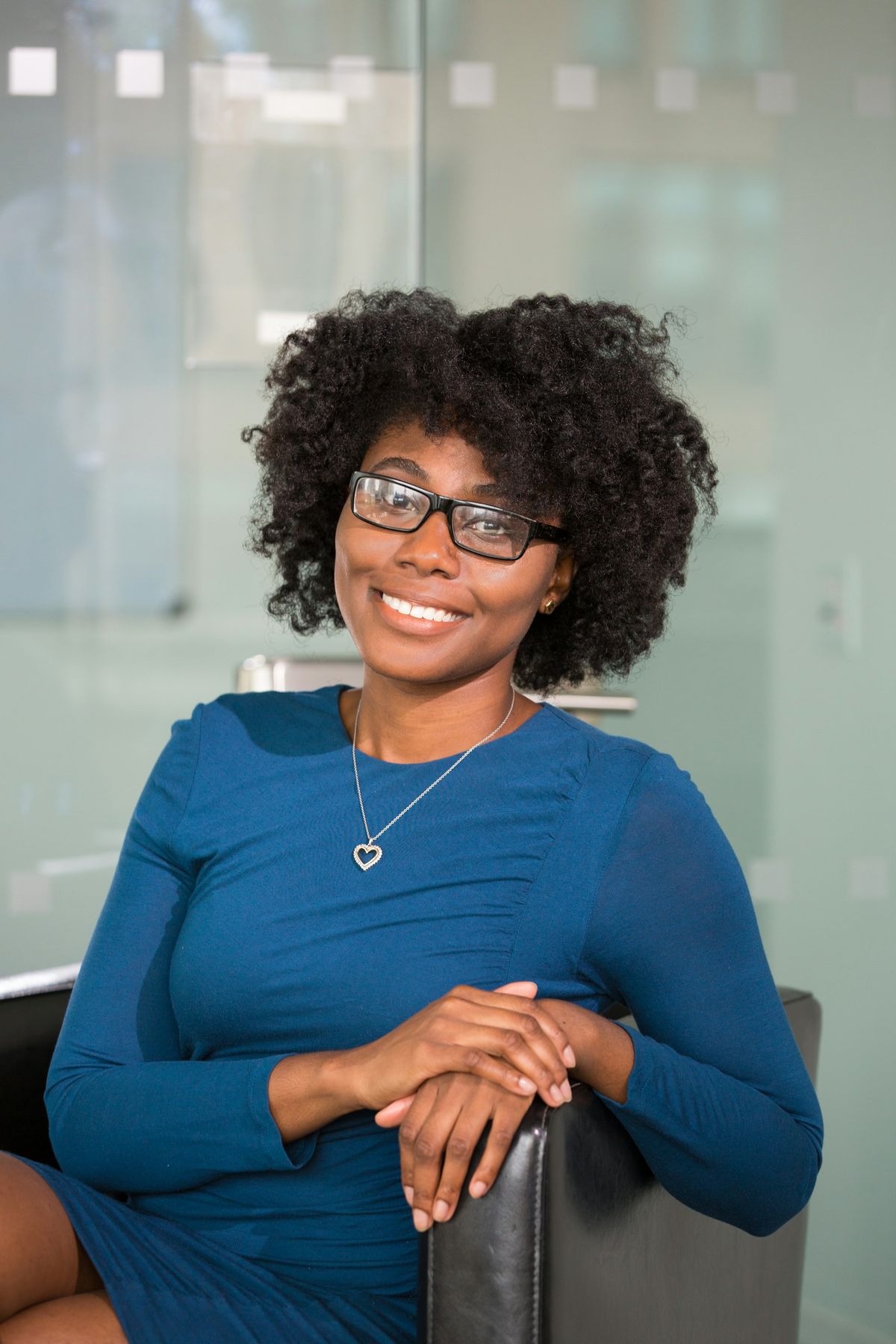 A smiling professional in an office